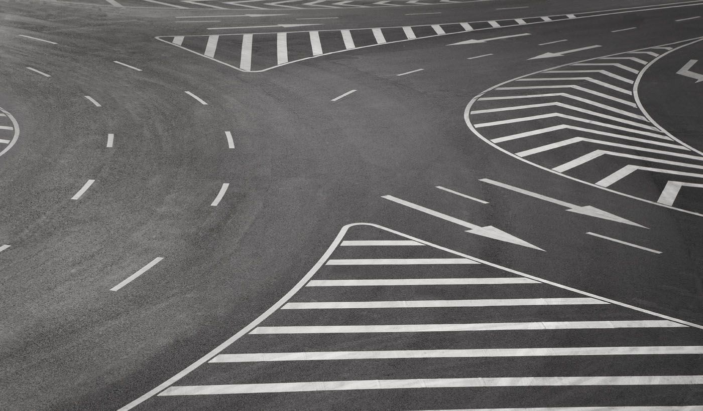 Freshly painted road markings on a DFW parking lot by Lucky Stripes